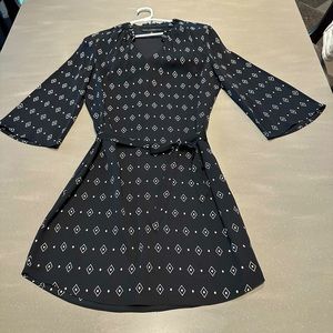 Black patterned dress from White House Black Market in Size 10